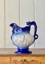 Load image into Gallery viewer, Blue graduated Neptune 'mask' jug with fish handle