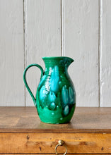 Load image into Gallery viewer, A hand thrown and green glazed jug