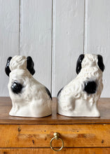 Load image into Gallery viewer, A pair of small black and white Beswick King Charles Spaniel mantle dogs