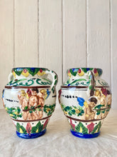 Load image into Gallery viewer, A pair of Italian putti vase with double handles