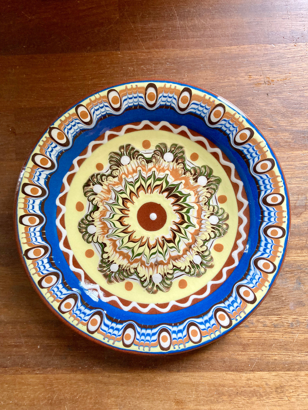 Enamel-style, hand decorated plate