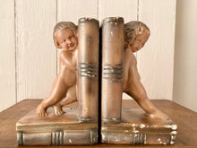 Load image into Gallery viewer, A rare pair of antique bronzed plaster bookends