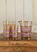 Load image into Gallery viewer, A pretty pink and gilt trimmed glass jug and six matching glasses