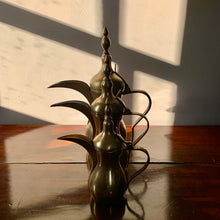 Load image into Gallery viewer, A striking set of three graduated size brass coffee pots
