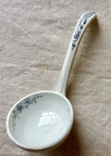 Load image into Gallery viewer, A china ladle with blue botanical detailing
