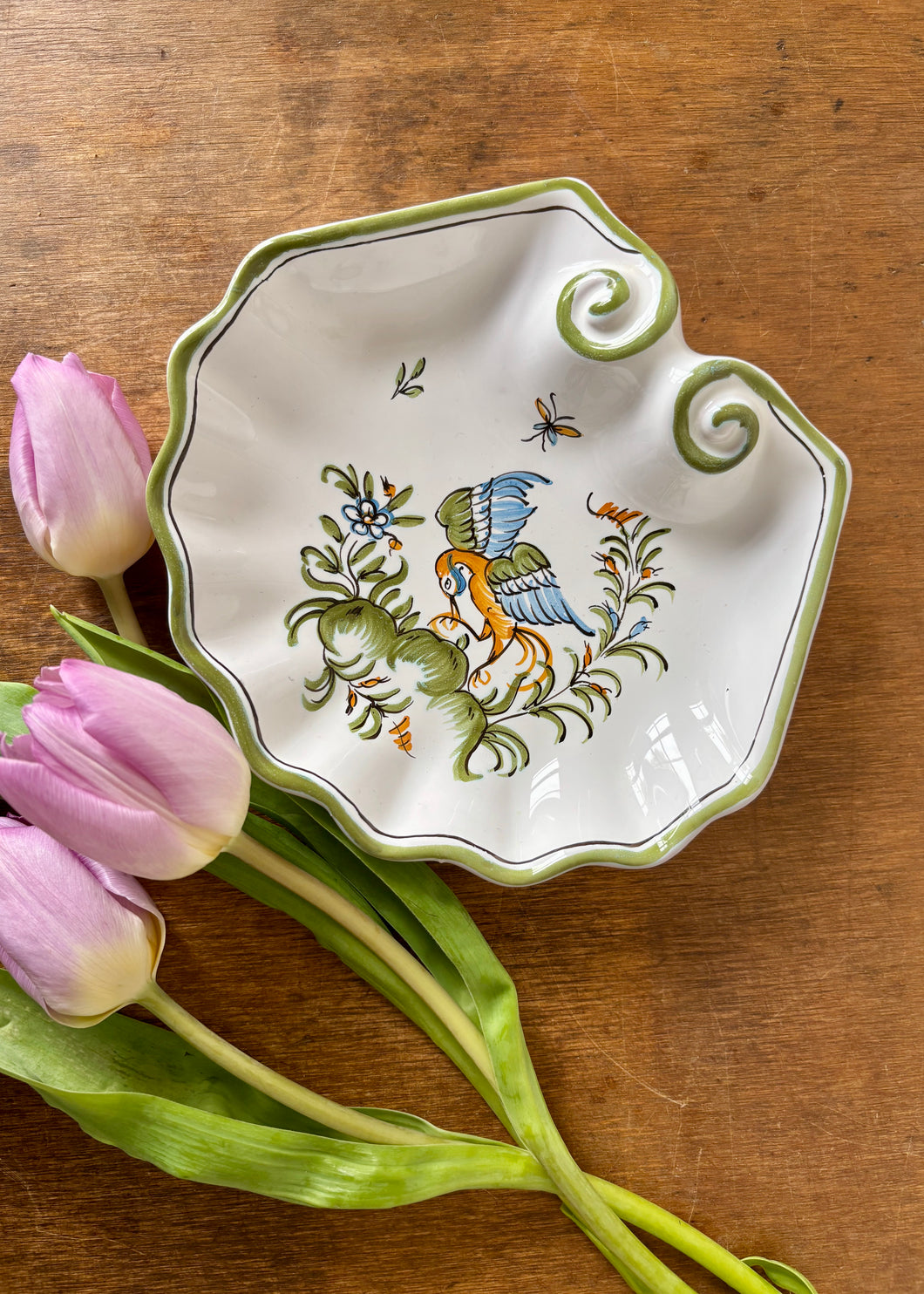 French scallop shell shaped dish with hand painted bird of paradise