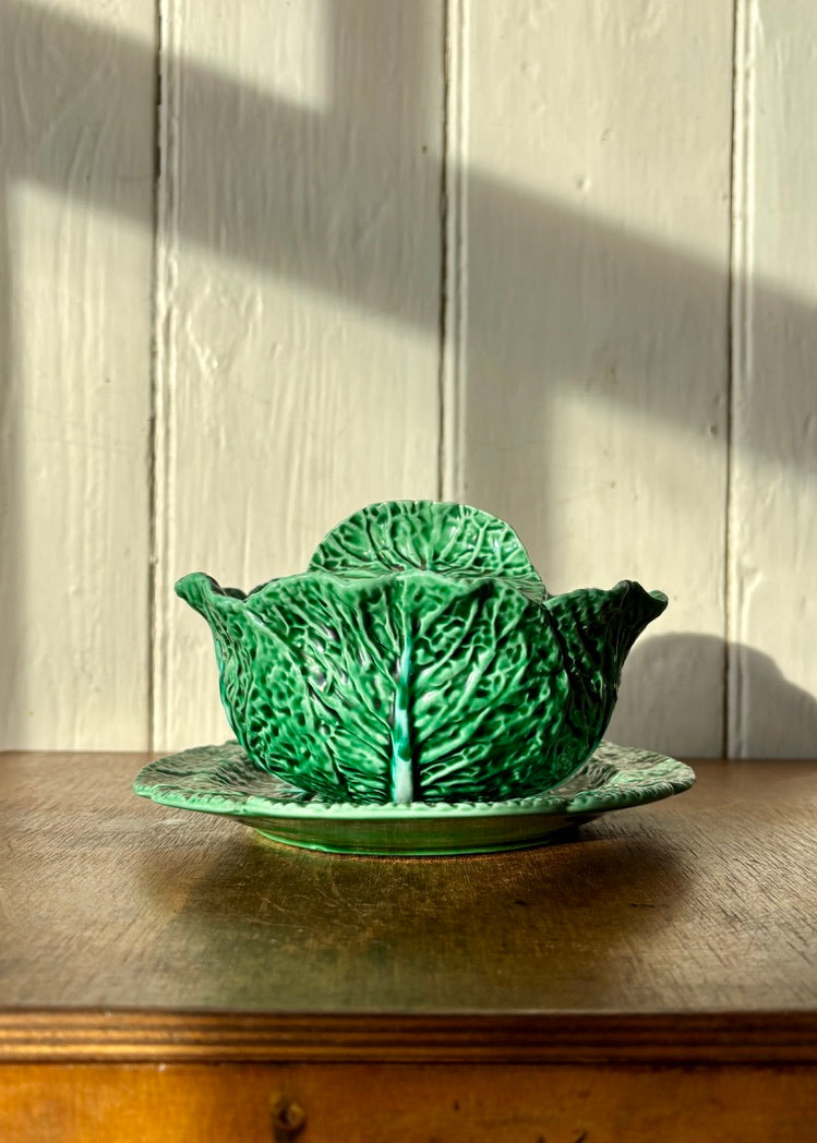 An early Bordallo Pinheiro cabbage ware lidded tureen and plate