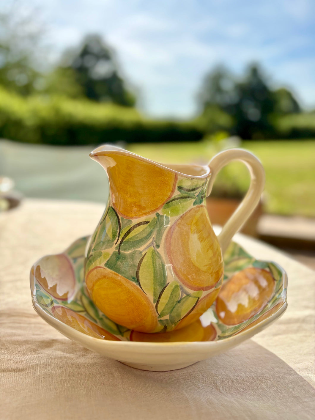 Large hand painted 'oranges' bowl and jug
