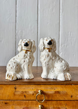 Load image into Gallery viewer, A pair of small white Royal Doulton Beswick King Charles Spaniel mantle dogs
