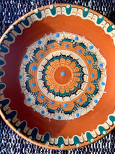 Load image into Gallery viewer, A pair of folk art hand painted terracotta plates
