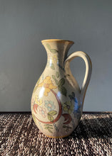 Load image into Gallery viewer, Studio pottery hand painted jug with floral design in muted shades
