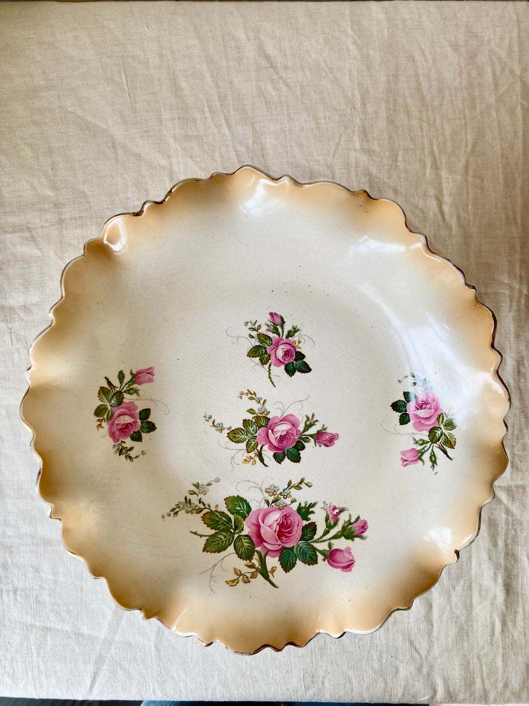 Blush pedestal cake stand with pink roses