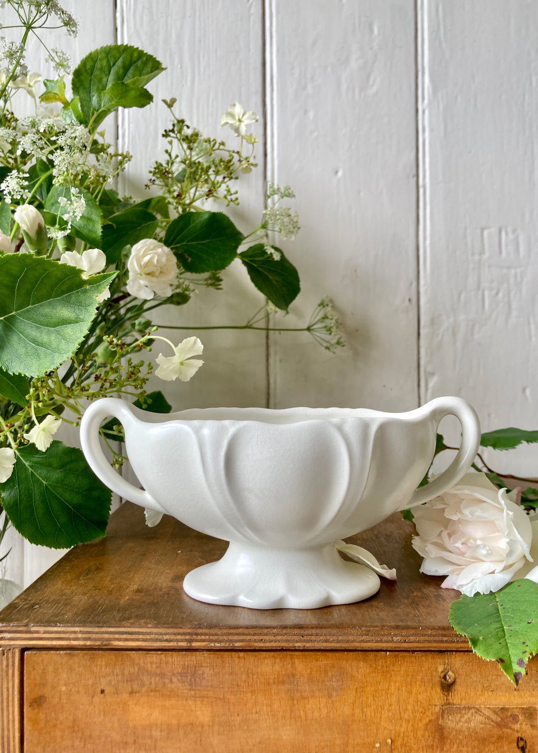 Small creamy white Beswick Ware mantle vase