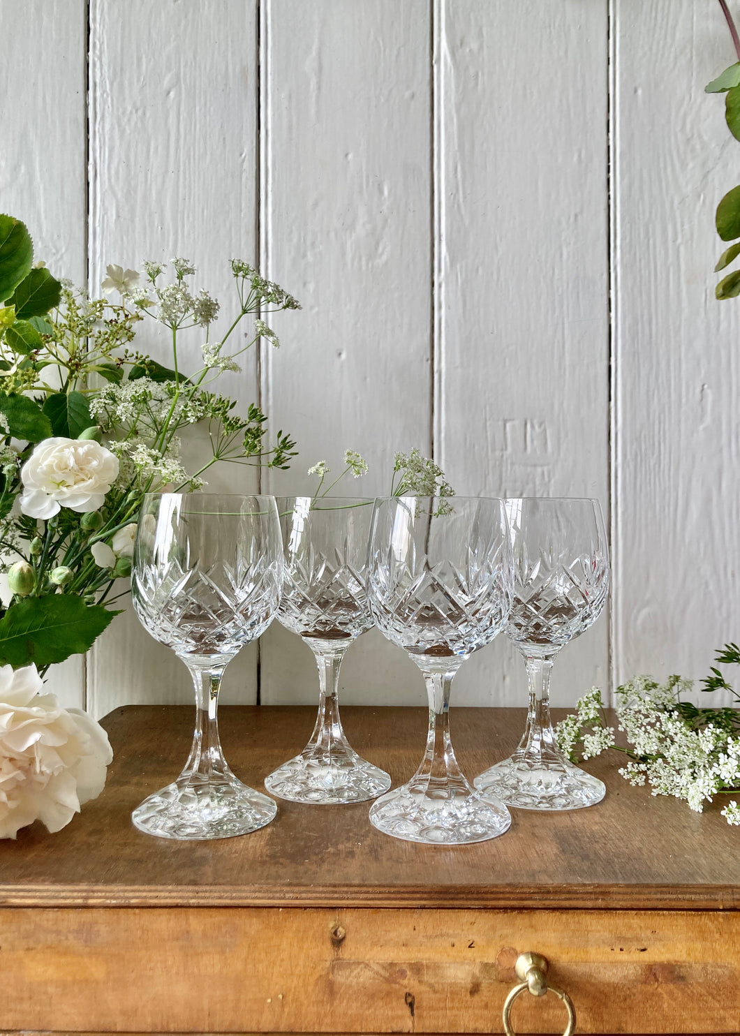 A set of 4 lead crystal vintage wine glasses