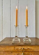 Load image into Gallery viewer, An elegant pair of clear pressed glass candlesticks
