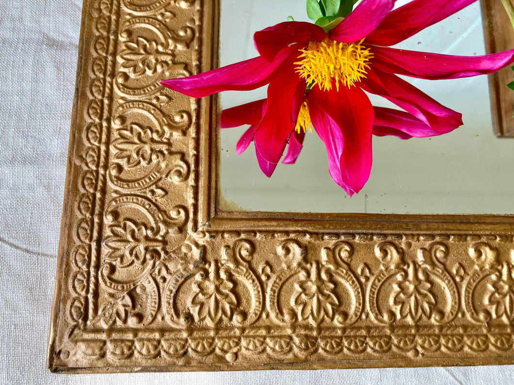 Decorative gilt framed mirror