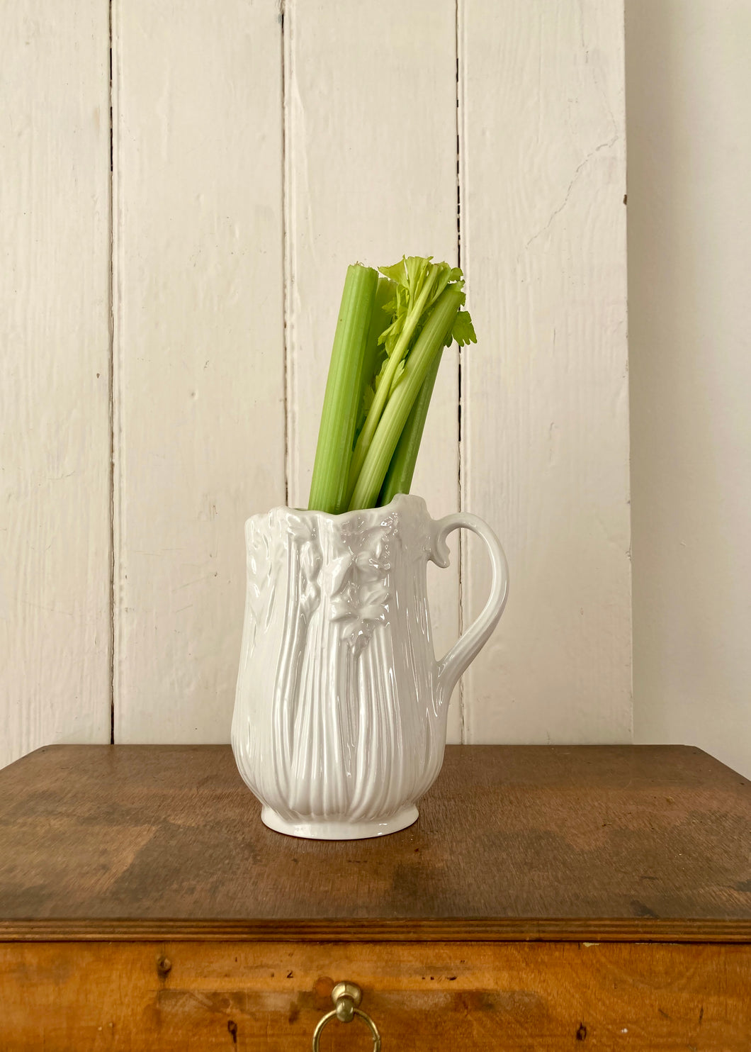 Elegant majolica white celery jug by Sylvac