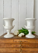 Load image into Gallery viewer, A pair of elegant Dartmouth Pottery classical white mantle urns
