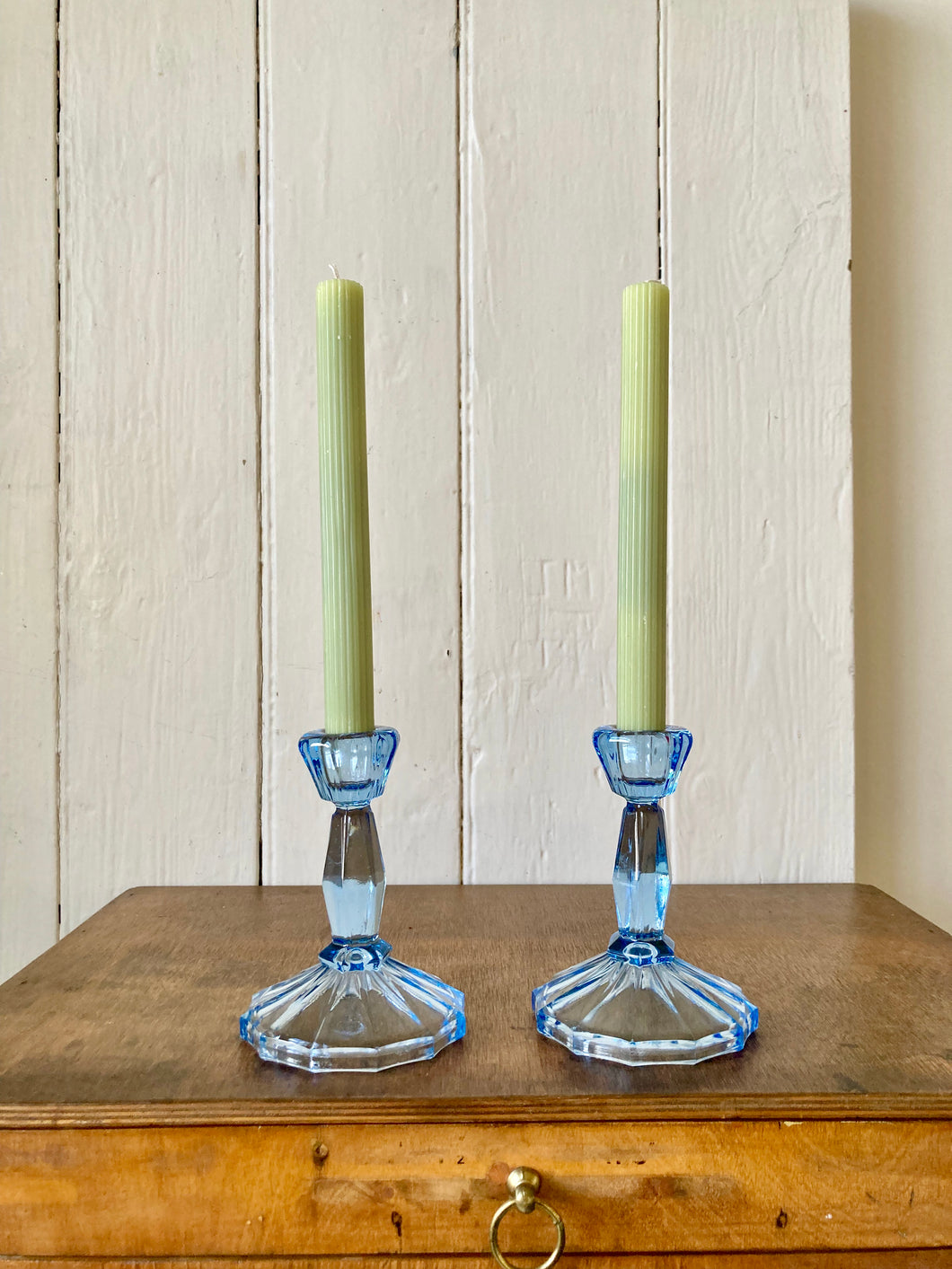 Ice blue pair of pressed glass candlesticks