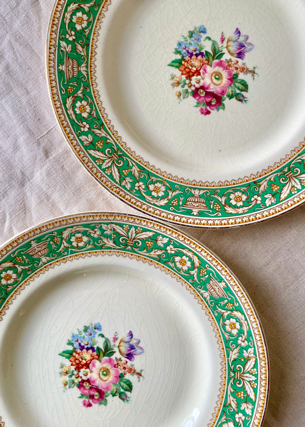 A pair of Regency-style Woods Ivory Ware plates
