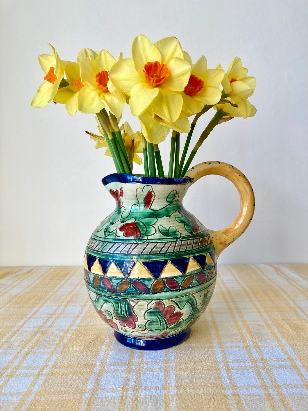 Antique hand thrown and decorated jug