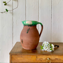 Load image into Gallery viewer, Large antique terracotta jug with green slip glazed rim
