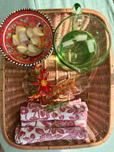 Load image into Gallery viewer, A set of four red on white printed floral napkins with plants and birds
