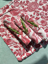 Load image into Gallery viewer, A set of four red on white printed floral napkins with plants and birds
