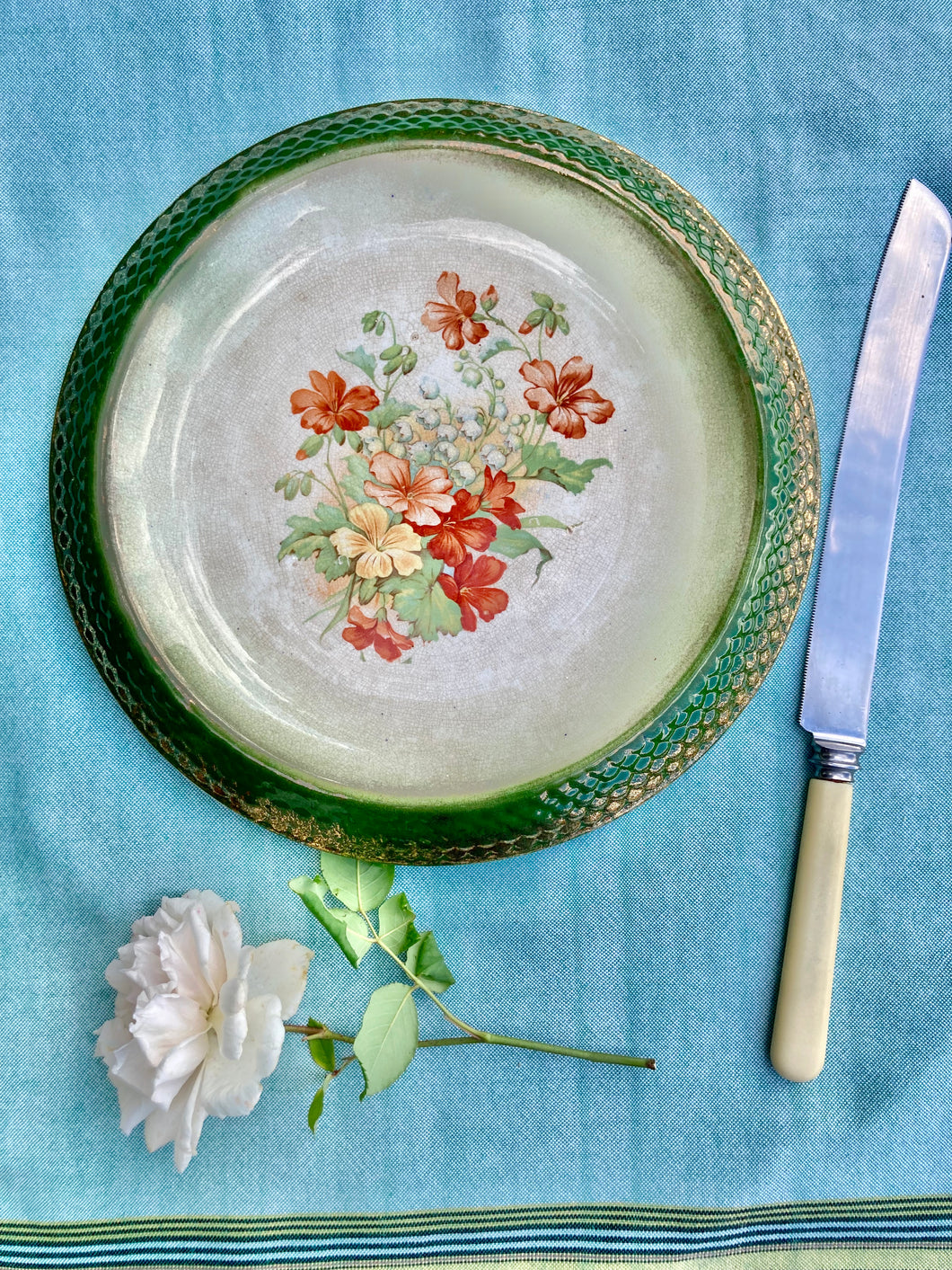 Antique floral, green and gilt edged cake or bread plate