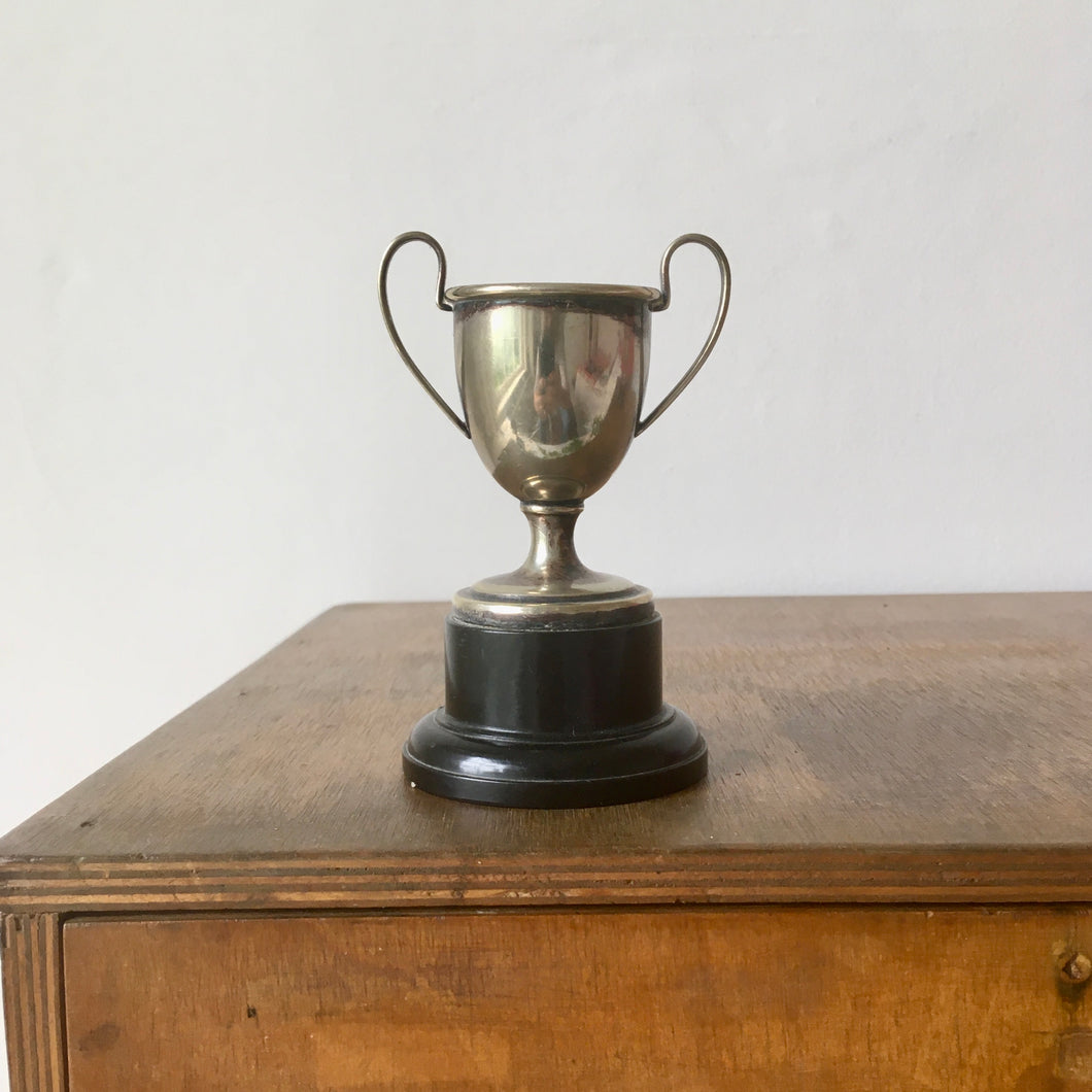 Silver plated trophy on stand