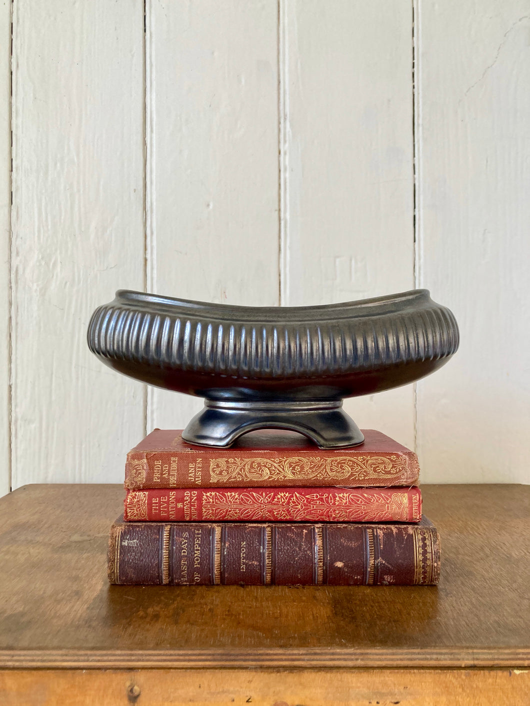 Dartmouth Pottery footed mantle vase in black lustre glaze