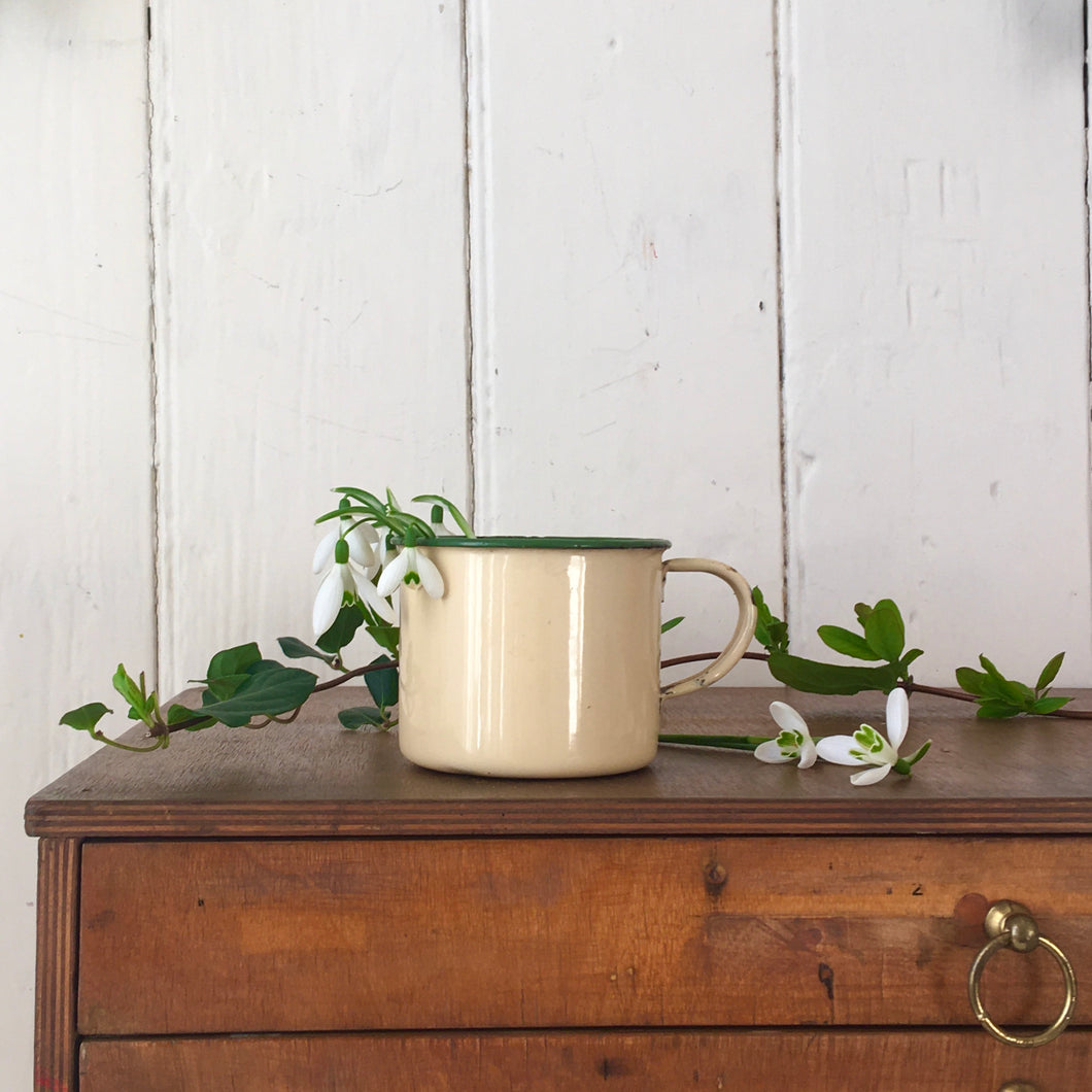 Buff coloured enamel mug