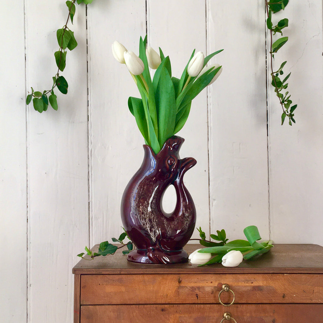 A characterful Seal gluggle jug or vase