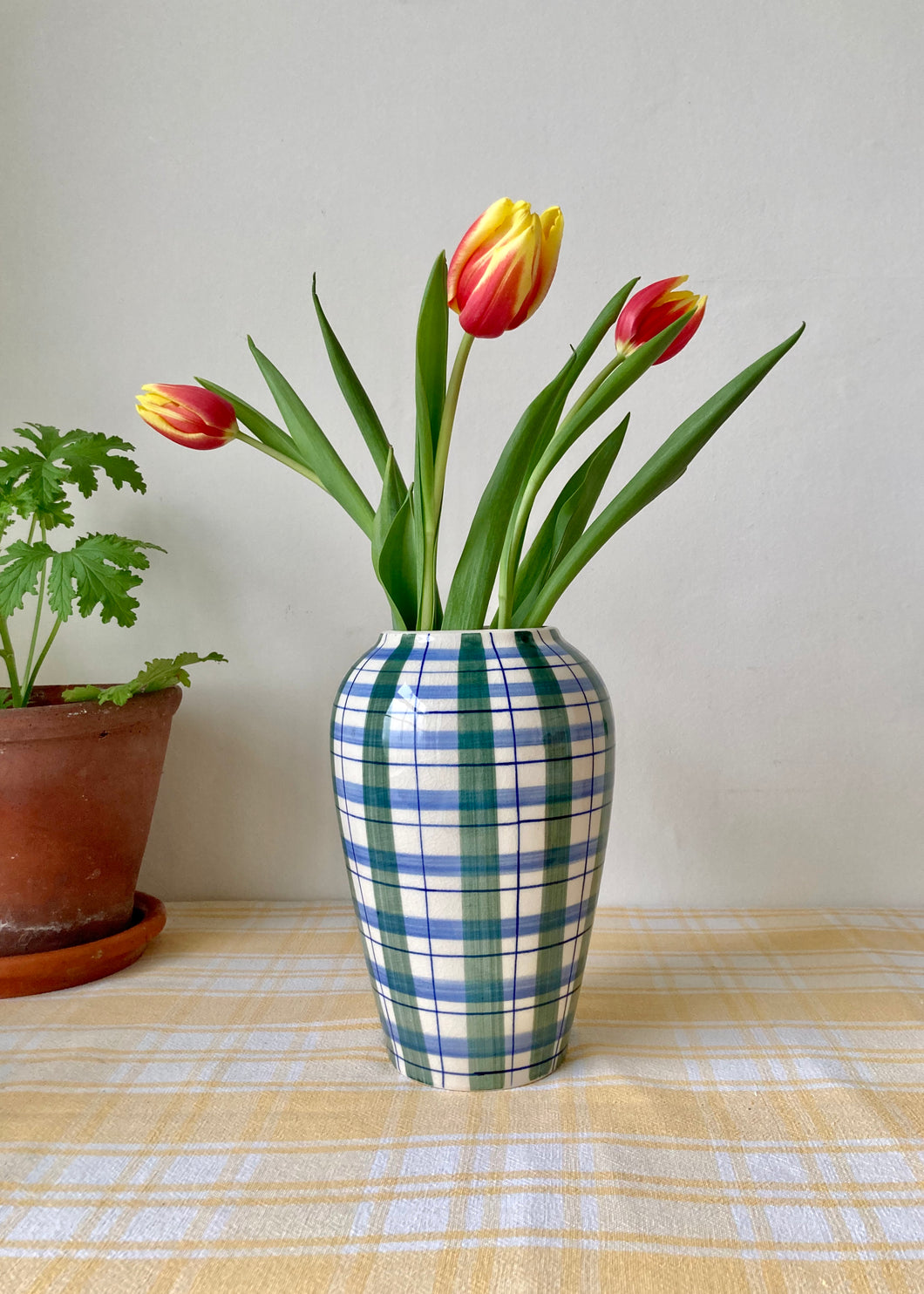 Green and blue check vase