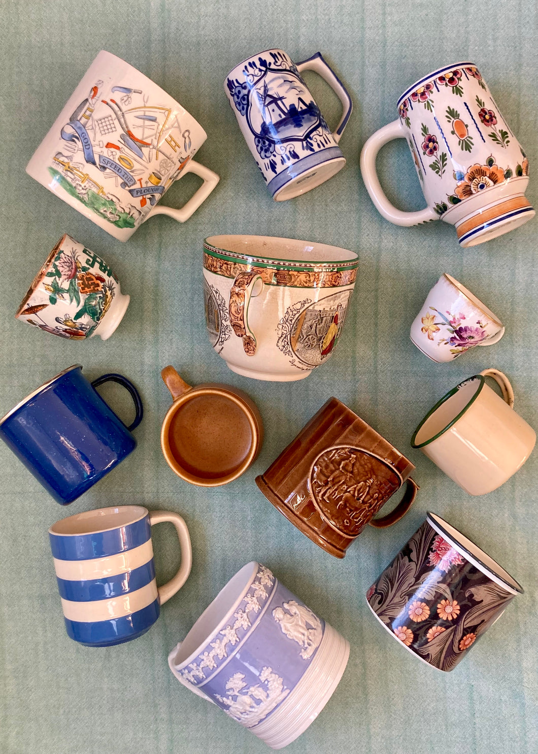 Deep blue speckled enamel mug with silver rim