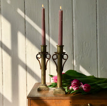 Load image into Gallery viewer, Pair of brass candlesticks with copper scrolls
