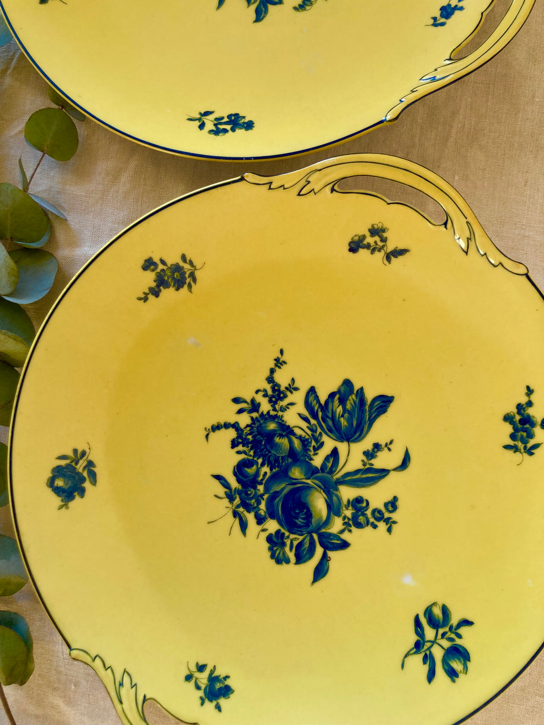 A pair of yellow Limoges 'Biarritz' plates by Pierre Begue