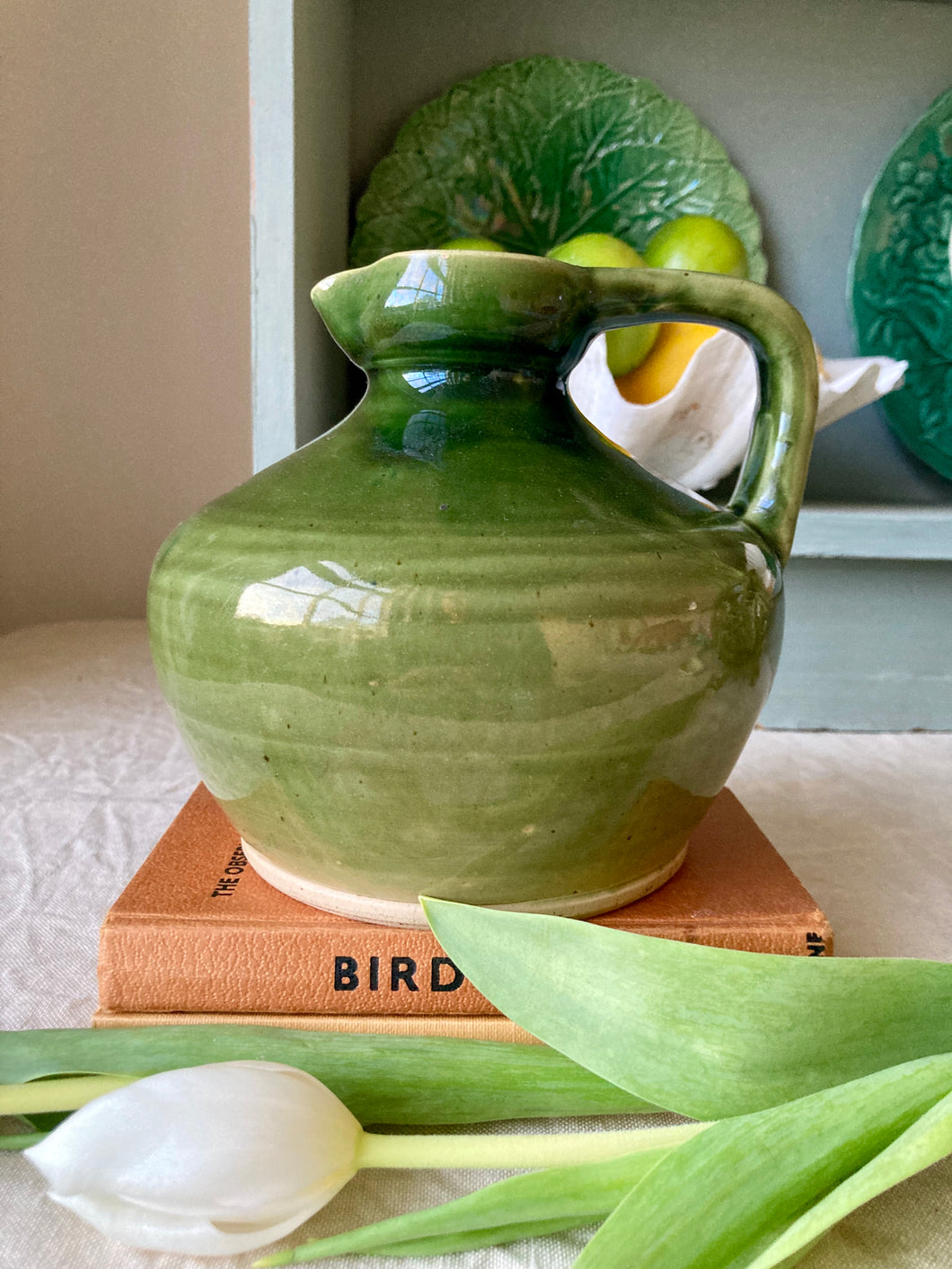 Green glazed stoneware flagon or jug by Govancroft