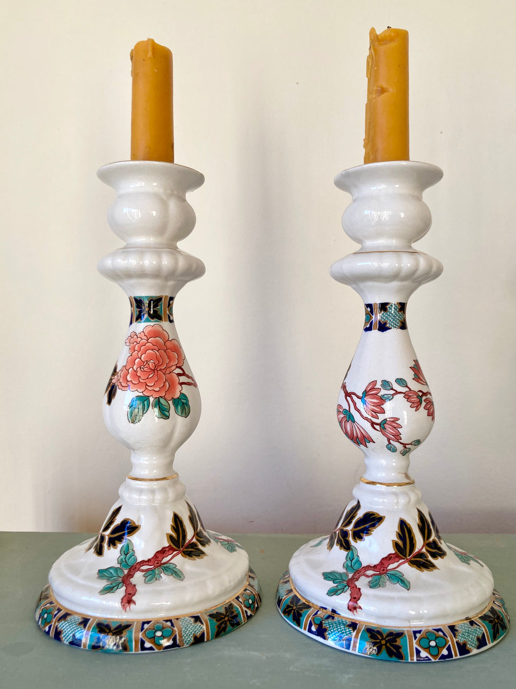 A pair of James Kent, Eastern Glory pattern china candlesticks
