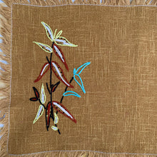 Load image into Gallery viewer, Hand embroidered, folk art style linen placemat with fringed edge.
