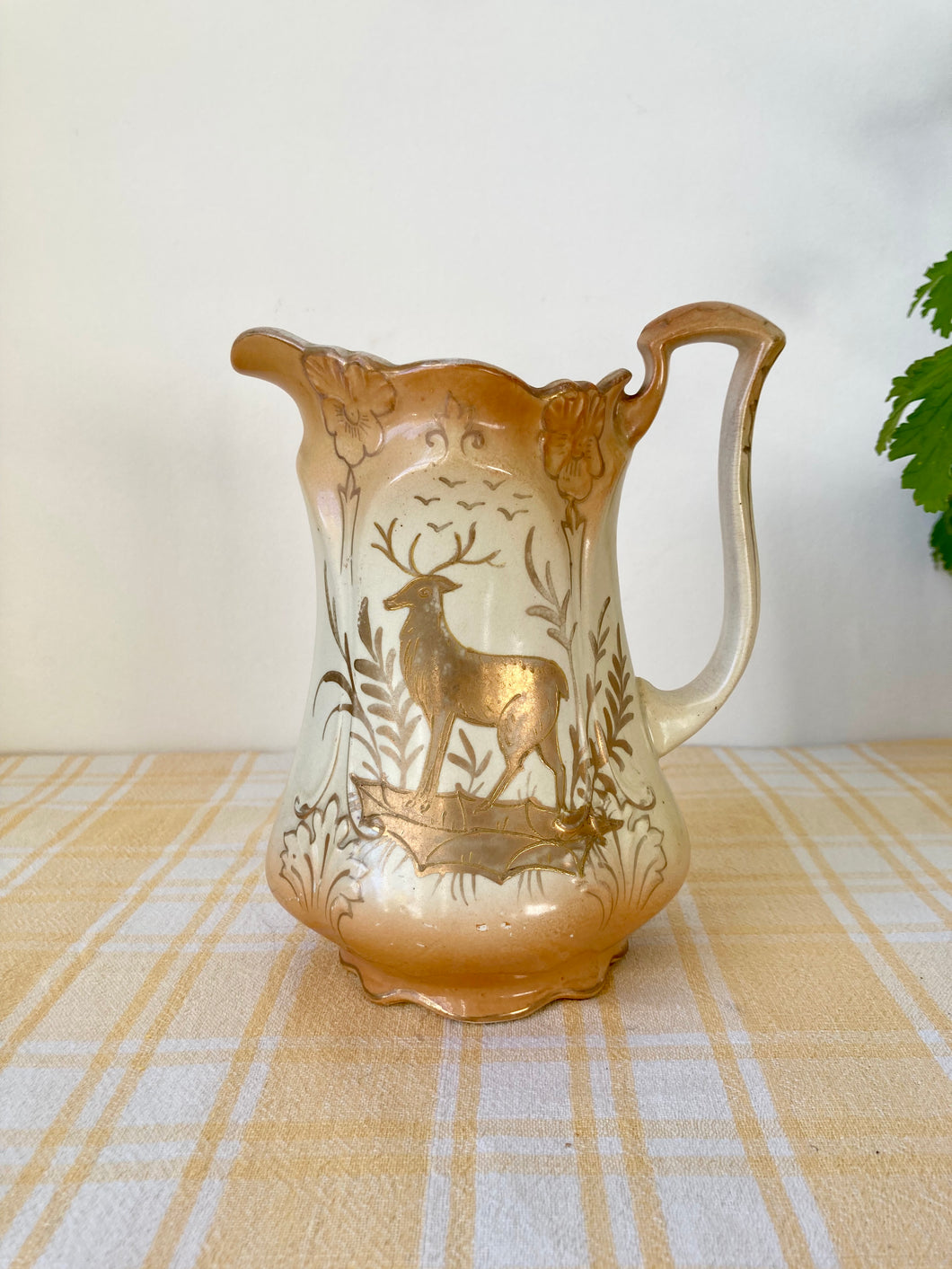 Blush and gilt jug with stag illustration